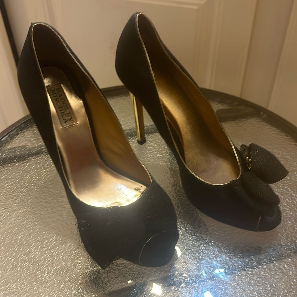 Black and gold high heels.